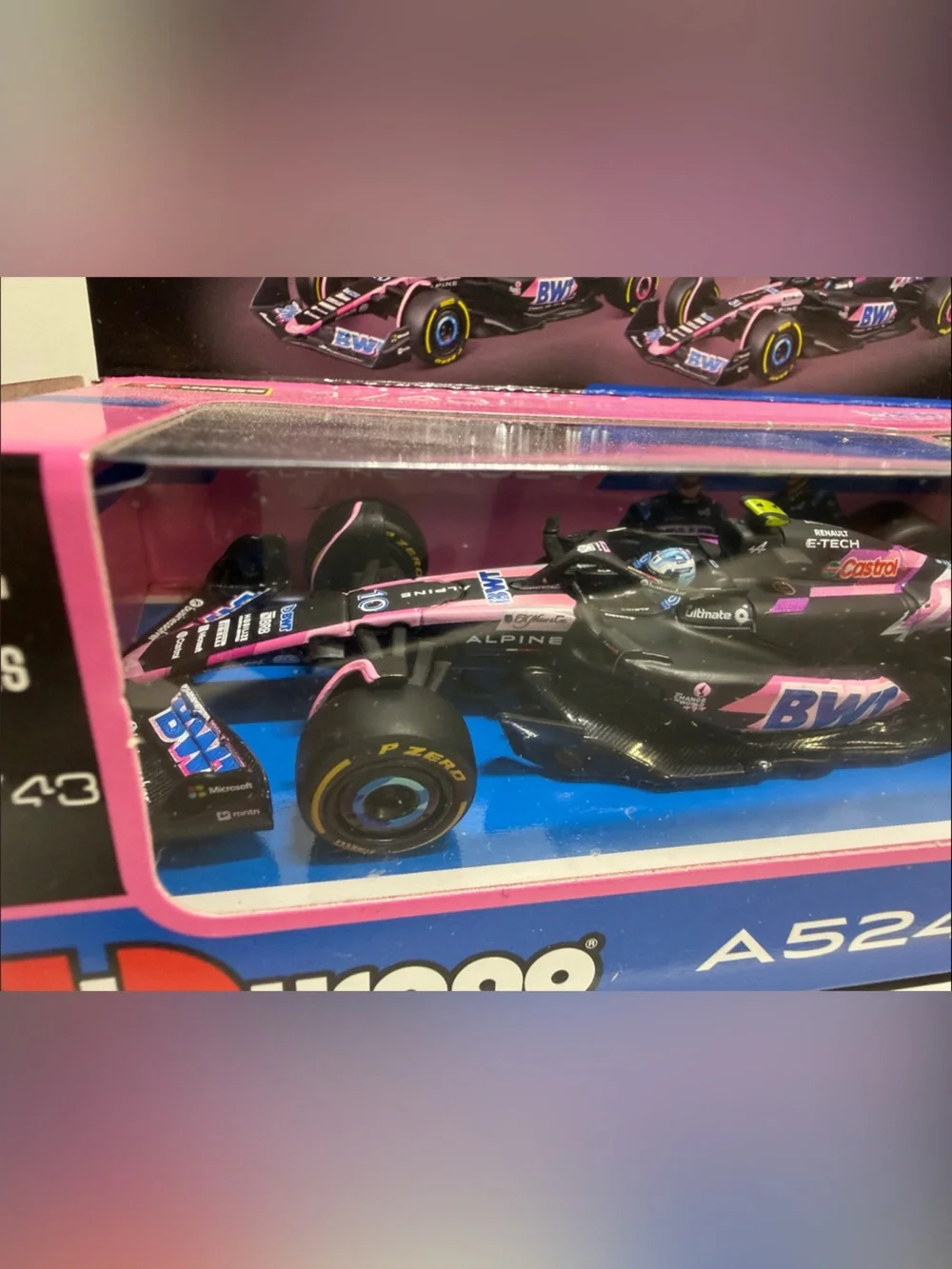 Bburago A524 BWT Alpine F1 Team Diecast Car - Pink & Blue with driver